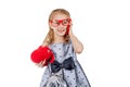 A small fashionist in red glasses is talking on the phone Royalty Free Stock Photo