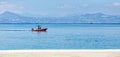 A rescue fast motor boat with a powerful motor patrols the coastline of the Gulf of Corinth