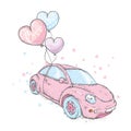 A small female car with balls in the shape of a heart.