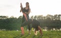 Small female fitness group doing yoga in park on a sunny day Royalty Free Stock Photo