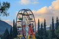 Small ferriswheel among trees