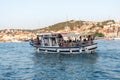 Small ferry approaching harbor