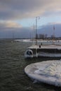 Small ferry pier in Tallinn on a frosty winter morning. Estonia