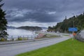 Small ferry terminal in Norway, car and passengers shipping process Royalty Free Stock Photo