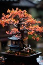 a small figure of a tree and with a wooden house in the bonsai style