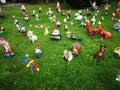 Small figurines in a garden on the grass