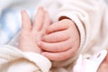 Small fingers, hands of a newborn baby close-up. small depth of focus area Royalty Free Stock Photo