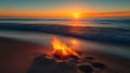 A Small Fire Burning on a Sandy Beach at Sunset Royalty Free Stock Photo