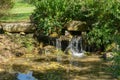 Small Fish Pond and Waterfall Royalty Free Stock Photo