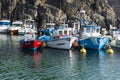 Small fisher boats in a small Atlantic harbor.