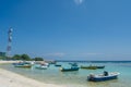 Small fishermen`s harbor with boats at the Villingili island