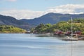 Small fishermen village with traditional red houses in Helgeland archipelago Royalty Free Stock Photo