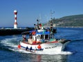 Small Fishing Boat to Harbour. Royalty Free Stock Photo