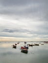 Small fishing boat anchored at the sea after working Royalty Free Stock Photo