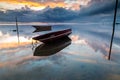 A small fishing boat boomed in the morning.