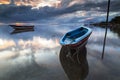 A small fishing boat boomed in the morning.