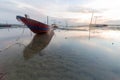 A small fishing boat boomed in the morning.