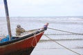 Fishing boat in the cloundy sea