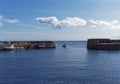 A small Fishing Boat entering Johnshaven Harbour after a morning emptying its Crab pots Royalty Free Stock Photo