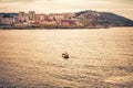 Small fishing boat fishing in the Atlantic Ocean along the coast of Galicia at sunset. A coruÃÂ±a, Spain