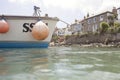 Close up of a small fishing boat in Mousehole Harbour