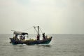 The small fishing boat on the open sea. Royalty Free Stock Photo