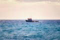 a small fishing boat in the open water on the atlantic ocean Royalty Free Stock Photo