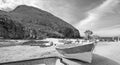 Small fishing boat / ponga at Punta Lobos beach on the coast of Baja California Mexico - black and white Royalty Free Stock Photo