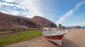 Small fishing boat / ponga at Punta Lobos beach on the coast of Baja California Mexico Royalty Free Stock Photo