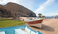 Small fishing boat / ponga at Punta Lobos beach on the coast of Baja California Mexico Royalty Free Stock Photo