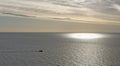 A small fishing Boat returning Home after tending to its Crab Pots in the North sea off Scotland. Royalty Free Stock Photo