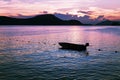 Small fishing boat in the sea, Dramatic sky in twilight time wit Royalty Free Stock Photo