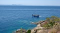 Small fishing boat at the sea at sunny day Royalty Free Stock Photo