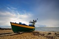 Small fishing boat on shore of the Baltic Sea in Gdynia, . Royalty Free Stock Photo