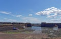 Small Fishing Boats alongside the Harbour Walls of Johnshaven Fishing Village Royalty Free Stock Photo