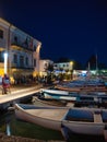 Small fishing boats anchored in the marina of the town of Bardolino on the shores of Lake Garda Royalty Free Stock Photo