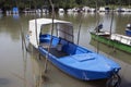 Fishing Boats Anchored at Rivers Shore Royalty Free Stock Photo