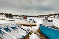 Small fishing boats beached for winter NL Canada Royalty Free Stock Photo