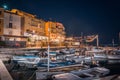 Small fishing boats docked in the beautiful small harbour sea port Royalty Free Stock Photo