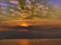 A small fishing boats floated on the sea water in the morning, fishermen sailed small boats during sunrise.  Fishermen at work. Royalty Free Stock Photo