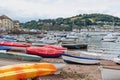 Beached craft along the shoreline at Teignmouth in Devon UK Royalty Free Stock Photo