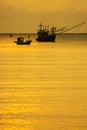 Small fishing boats in  the sea sea in Twilight time Royalty Free Stock Photo