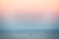 Small fishing boats in South China Sea at dusk, Mui Ne, Vietnam Royalty Free Stock Photo