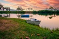 A small fishing boats wait on the shore