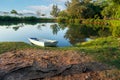 A small fishing boats wait on the shore