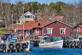 Small fishing harbor of Grisslehamn during a clear spring day