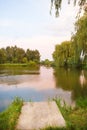 A small fishing lake, rest, summer, fishing, camping, morning Royalty Free Stock Photo