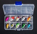 Small fishing lures for catching predatory fish in a box Royalty Free Stock Photo