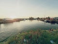 Small fishing port with boats anchored and moored on sea bay in Sweden. Built stony dam, Royalty Free Stock Photo