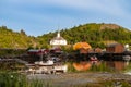 A small fishing village on the coast of a fjord in Norway Royalty Free Stock Photo